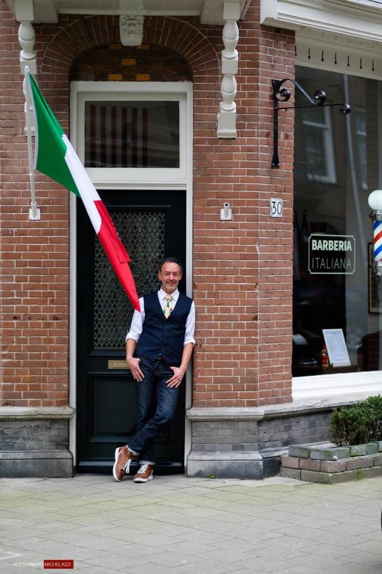 Massimiliano posing outside his salon
