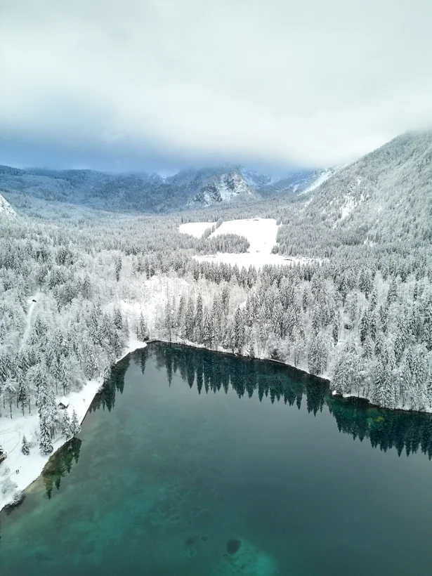 Frozen: winter snowy photos shot at the beautiful location of Fusine Lakes in the Friuli Venezia Giulia Italian region