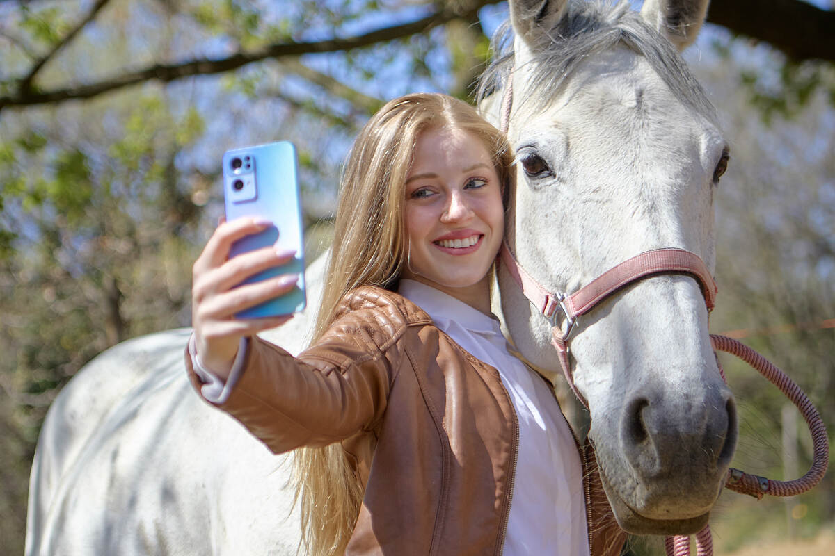 Lifestyle shooting with a white horse commissioned by oppo for reno 7 pro